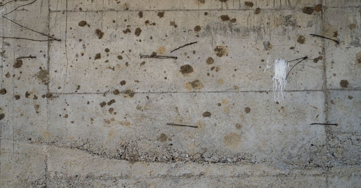Weathered concrete with exposed reinforcement